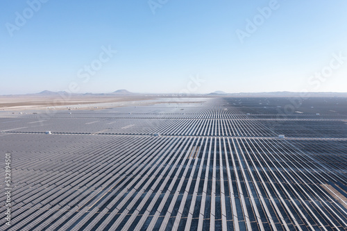 Solar energy farm producing clean renewable energy from the sun . Thousands of solar panels, Photovoltaic solar cells.