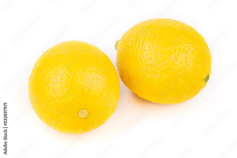 Juicy, fresh, yellow lemons on a white background. Creative food concept. Juicy, fresh, yellow lemons on a white background. Creative food concept.
