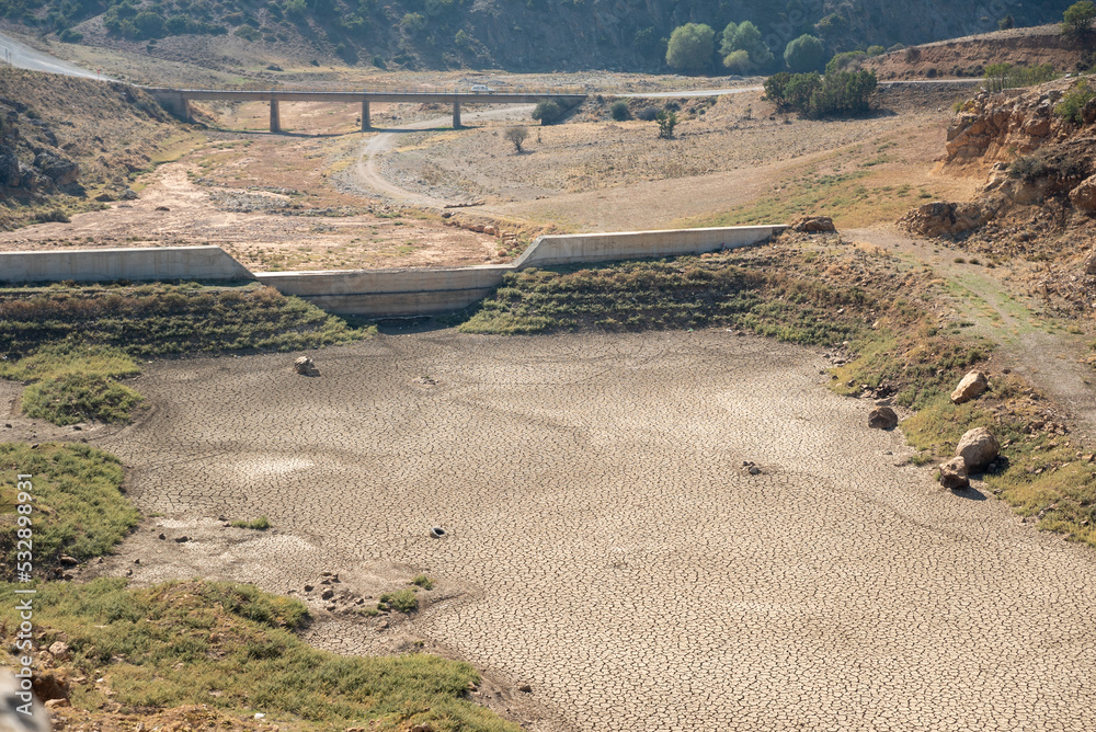 Obraz premium Aerial view of a drought lake and abandoned old dam. Climate change, global warming