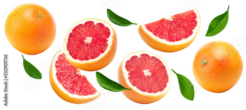 flying grapefruits with greew leaves isolated on white background. clipping path