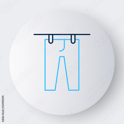 Line Drying clothes icon isolated on white background. Clean pants. Wash clothes on a rope with clothespins. Clothing care and tidiness. Colorful outline concept. Vector