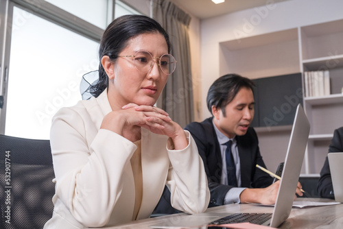 Colleague of business working in office