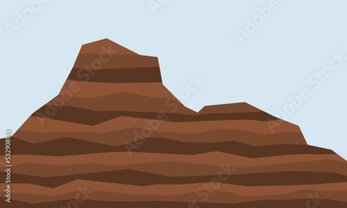 Brown bedded sedimentary mountain. Rock and soil slope.