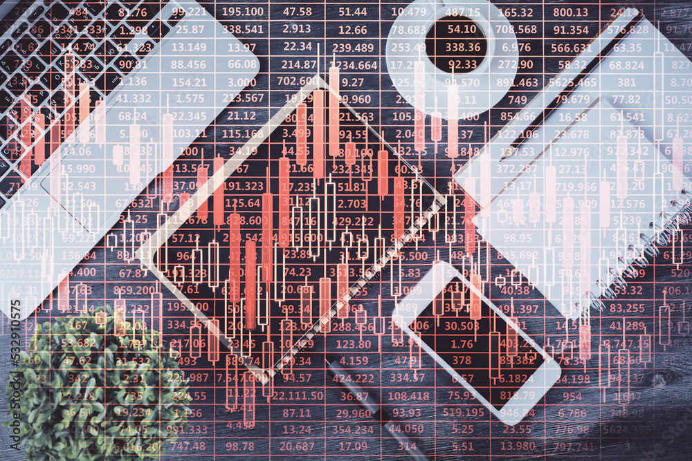 Double exposure of forex chart hologram over desktop with phone. Top view. Mobile trade platform concept. Double exposure of forex chart hologram over desktop with phone. Top view. Mobile trade platform concept.