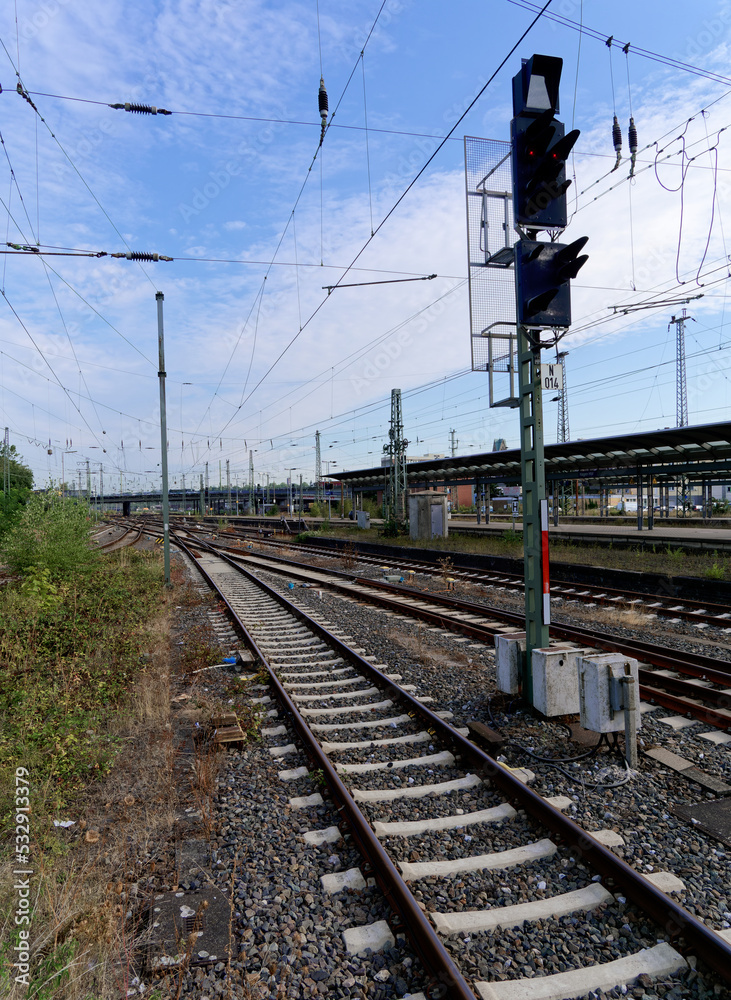 Fototapeta premium Train signal shows red. Exit from the train station.
