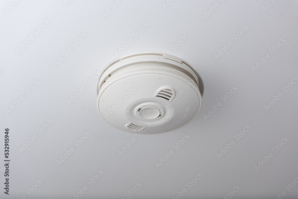 Closeup of a fire alarm on the ceiling. Closeup of a fire alarm on the ceiling.
