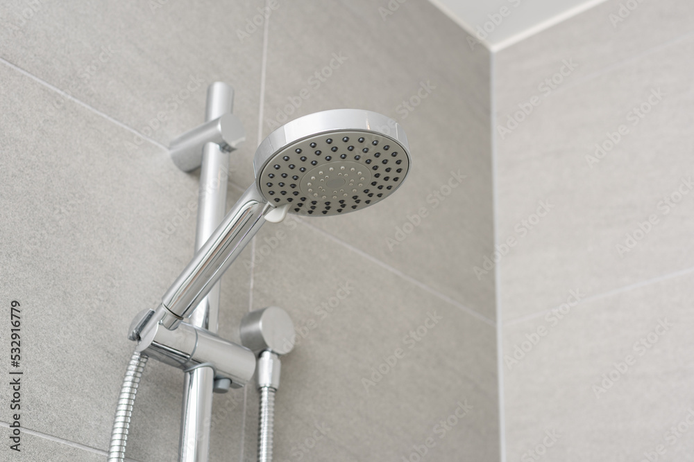 Obraz premium Clean shower head in modern bathroom.