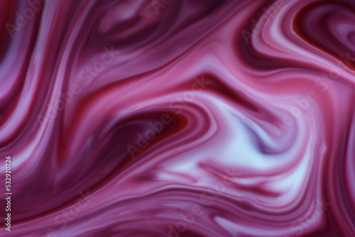 An abstract image of a creamy  fluid  swirling  satin-like appearance surface created from milk and red and blue food colouring 