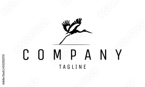Illustration silhouette flying stork bird logo design vector