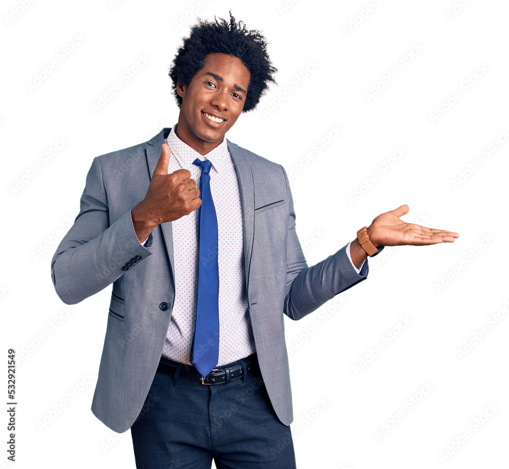 Handsome african american man with afro hair wearing business jacket showing palm hand and doing ok gesture with thumbs up, smiling happy and cheerful Handsome african american man with afro hair wearing business jacket showing palm hand and doing ok gesture with thumbs up, smiling happy and cheerful
