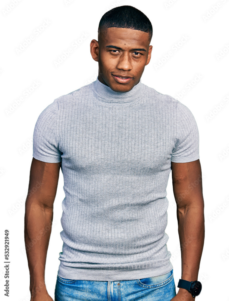 Young black man wearing casual t shirt with a happy and cool smile on face. lucky person.
