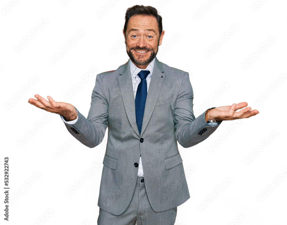 Middle age man wearing business clothes smiling cheerful offering hands giving assistance and acceptance. Middle age man wearing business clothes smiling cheerful offering hands giving assistance and acceptance.