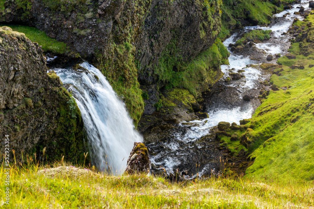 Naklejka premium an unknown little waterfall next to the famous Seljalandsfoss waterfall, Iceland