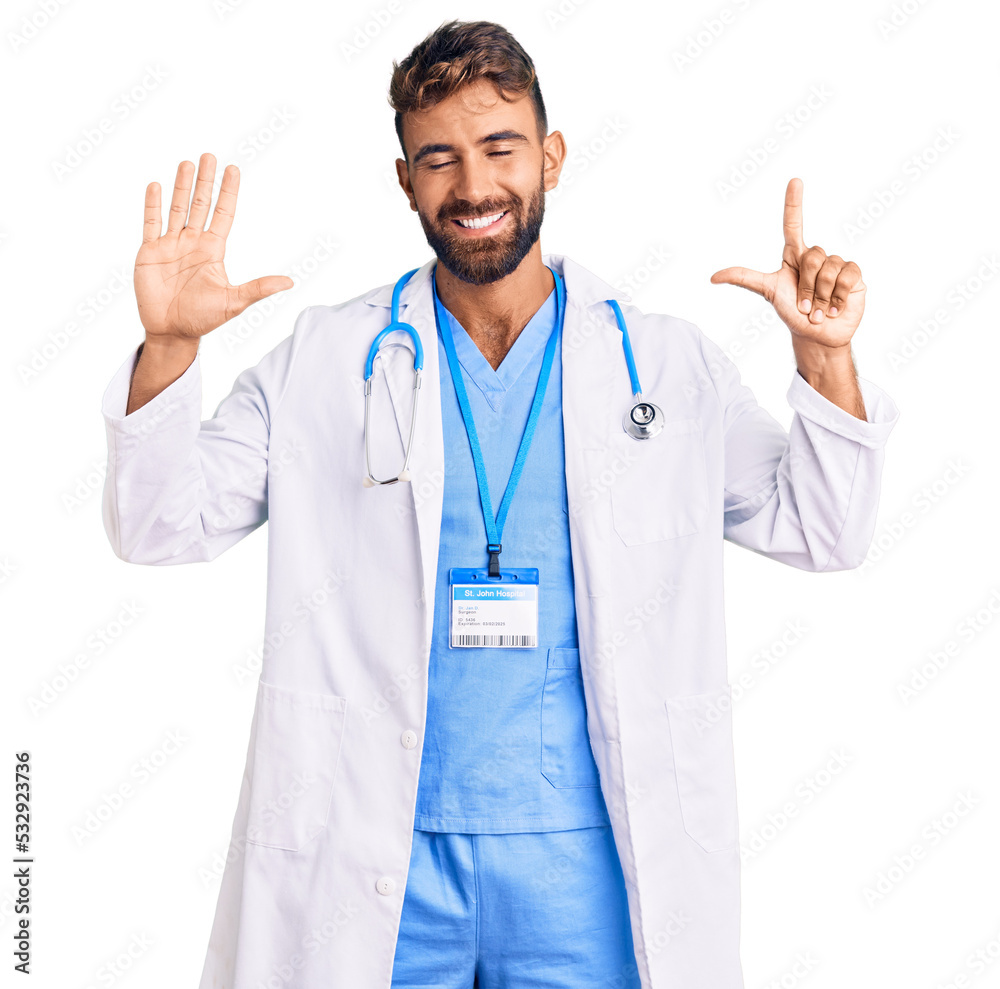 Young hispanic man wearing doctor uniform and stethoscope showing and pointing up with fingers number seven while smiling confident and happy. Young hispanic man wearing doctor uniform and stethoscope showing and pointing up with fingers number seven while smiling confident and happy.
