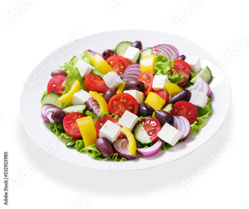 plate of greek salad on white background