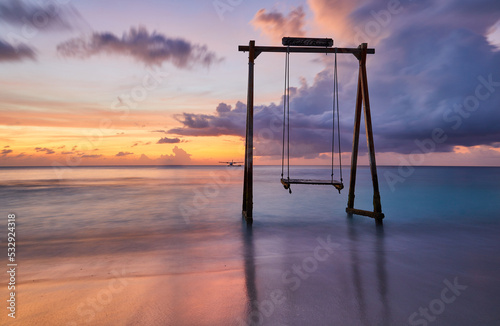 Sea swing at dawn