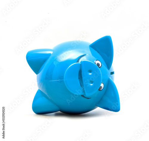 Blaues Liegendes Sparschwein auf hellem Hintergrund