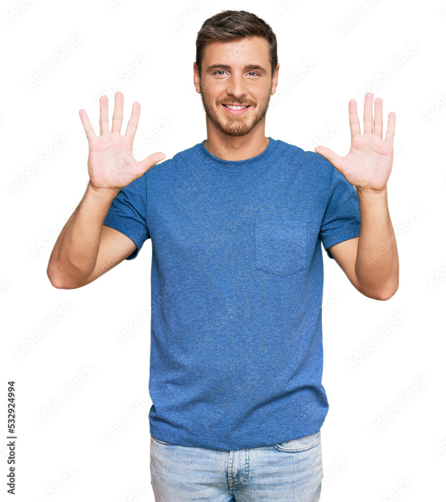 Fototapeta premium Handsome caucasian man wearing casual clothes showing and pointing up with fingers number ten while smiling confident and happy.