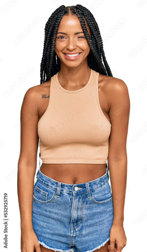 Beautiful hispanic woman wearing casual clothes winking looking at the camera with sexy expression, cheerful and happy face. Beautiful hispanic woman wearing casual clothes winking looking at the camera with sexy expression, cheerful and happy face.