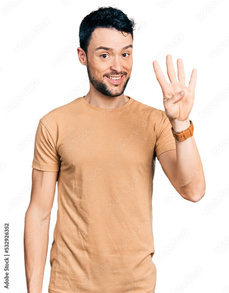 Hispanic man with beard wearing casual t shirt showing and pointing up with fingers number four while smiling confident and happy.