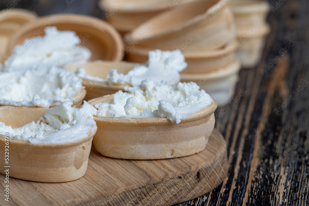 Waffle basket with cream curd cream inside Waffle basket with cream curd cream inside