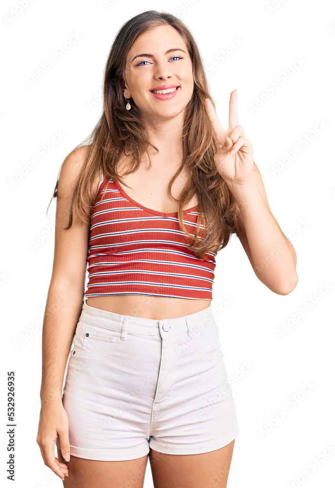 Beautiful caucasian young woman wearing casual clothes showing and pointing up with fingers number two while smiling confident and happy. Beautiful caucasian young woman wearing casual clothes showing and pointing up with fingers number two while smiling confident and happy.