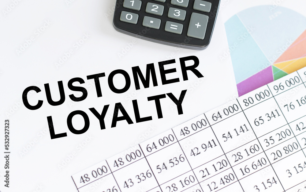 Customer Loyalty text written on a notebook with pencils. Customer Loyalty text written on a notebook with pencils.