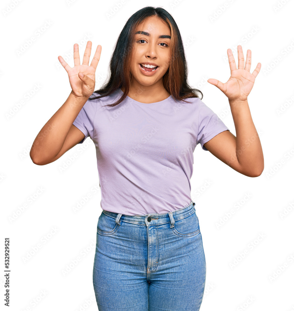 Young latin woman wearing casual clothes showing and pointing up with fingers number nine while smiling confident and happy. Young latin woman wearing casual clothes showing and pointing up with fingers number nine while smiling confident and happy.