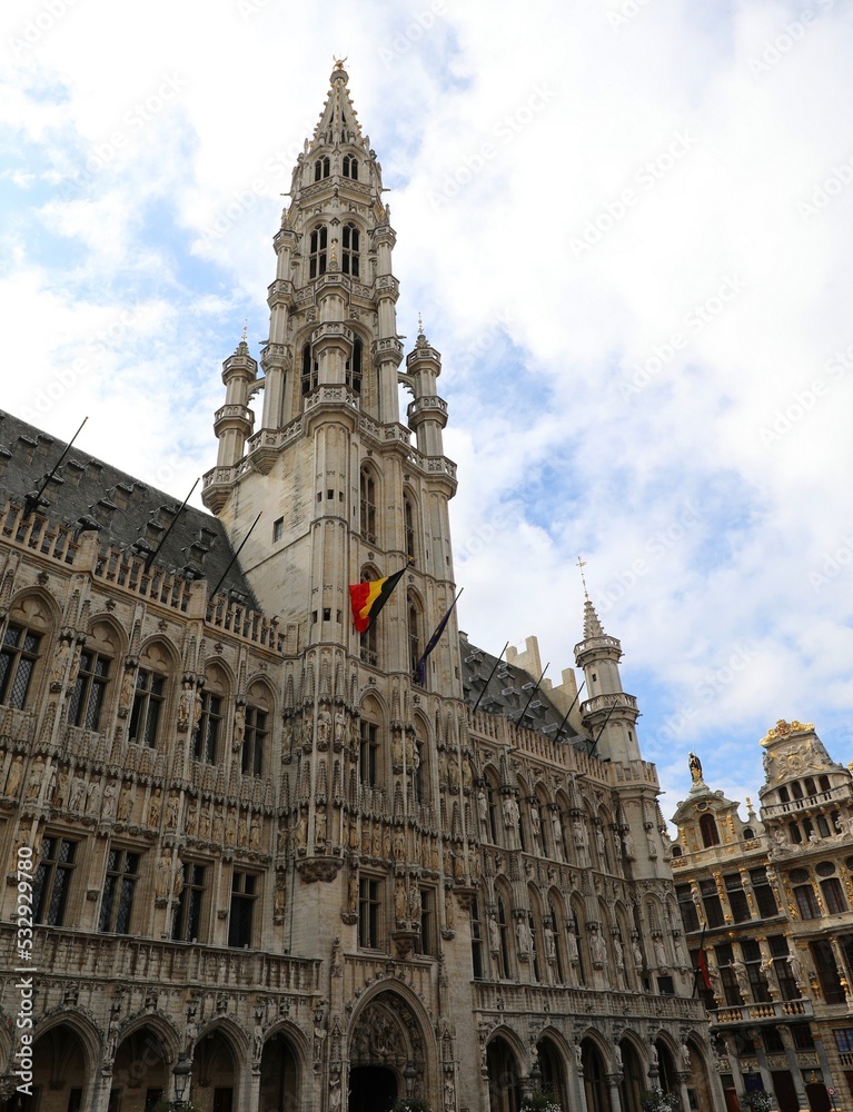Brussels town hall and the belgian flag in Grand Place