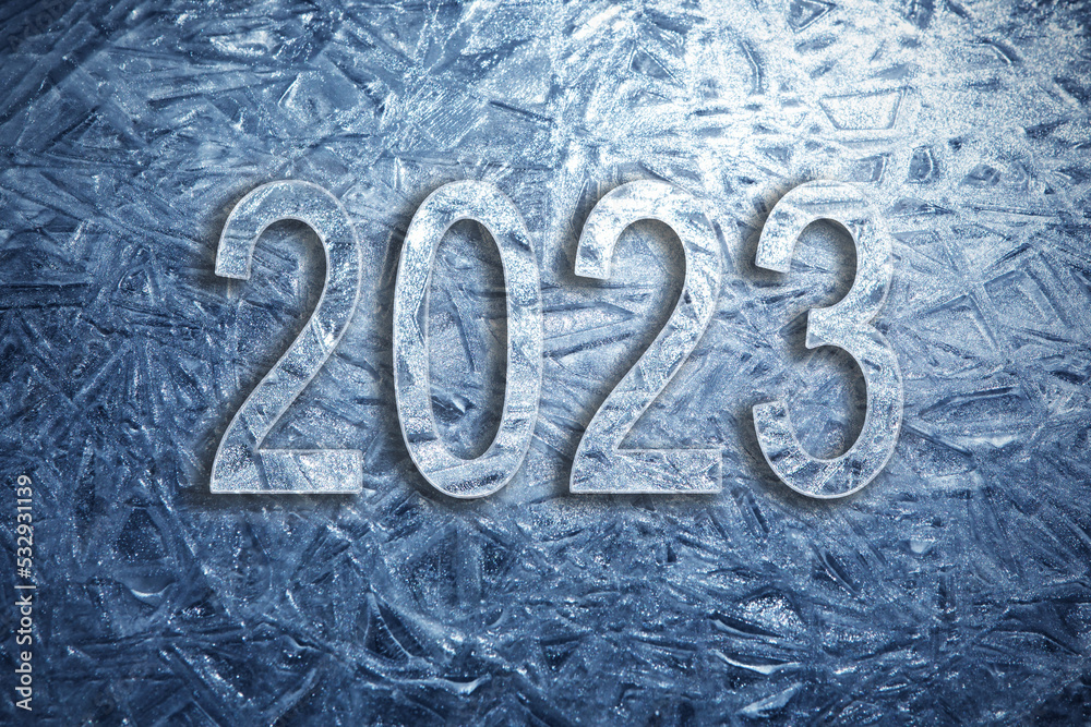 New Year card with text 2023. Ice surface texture. Winter background, festive background in a blue tone in the form of ice crystals. New Year card with text 2023. Ice surface texture. Winter background, festive background in a blue tone in the form of ice crystals.