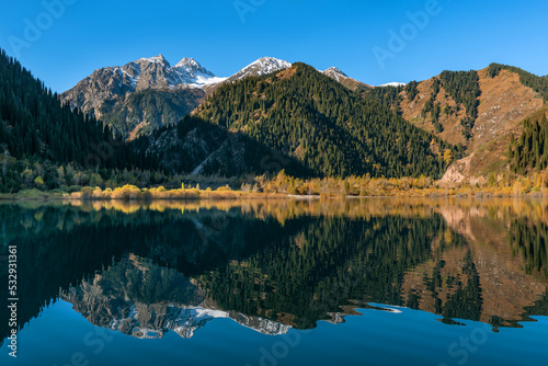 Picturesque mountain lake in autumn morning