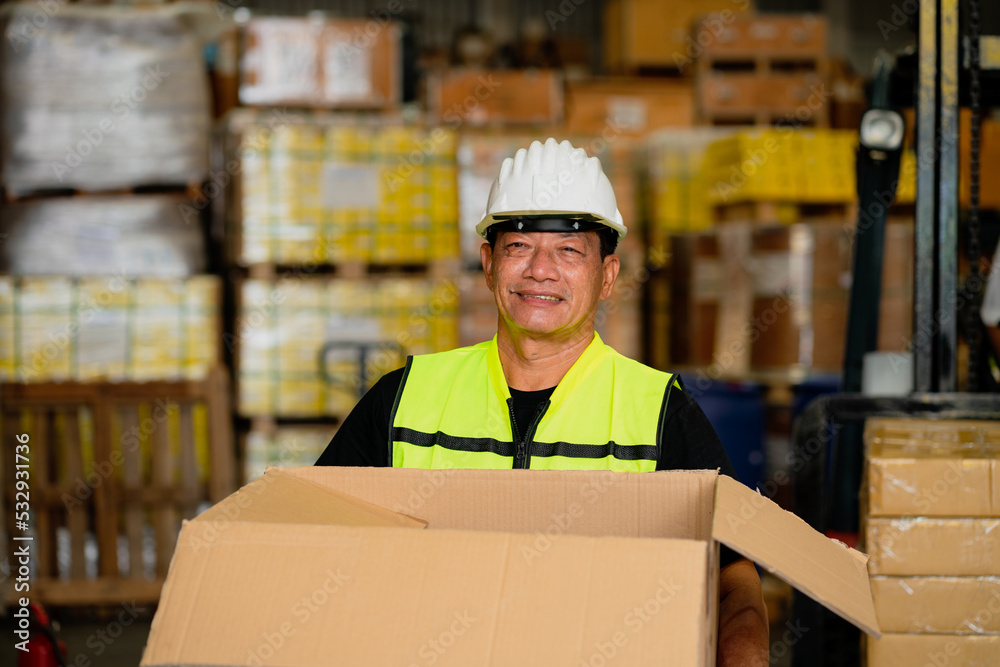Portrait of man staff working in warehouse, Industrial and industrial workers concept. Portrait of man staff working in warehouse, Industrial and industrial workers concept.