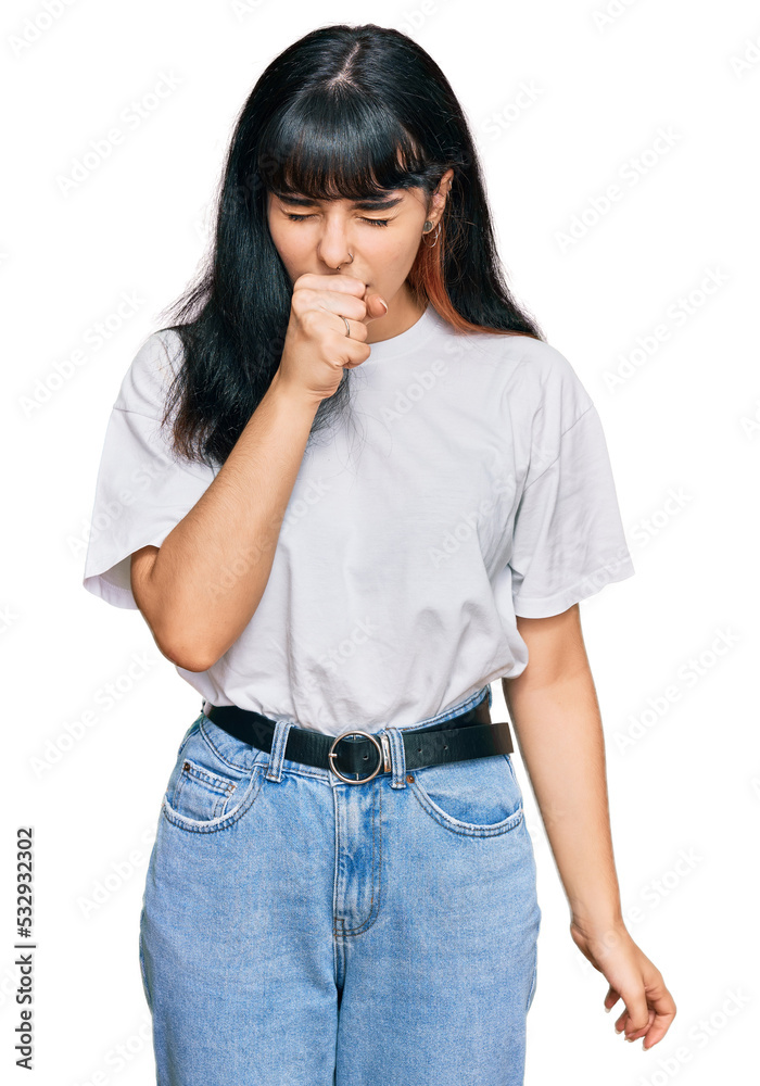Young hispanic girl wearing casual clothes feeling unwell and coughing as symptom for cold or bronchitis. health care concept.
