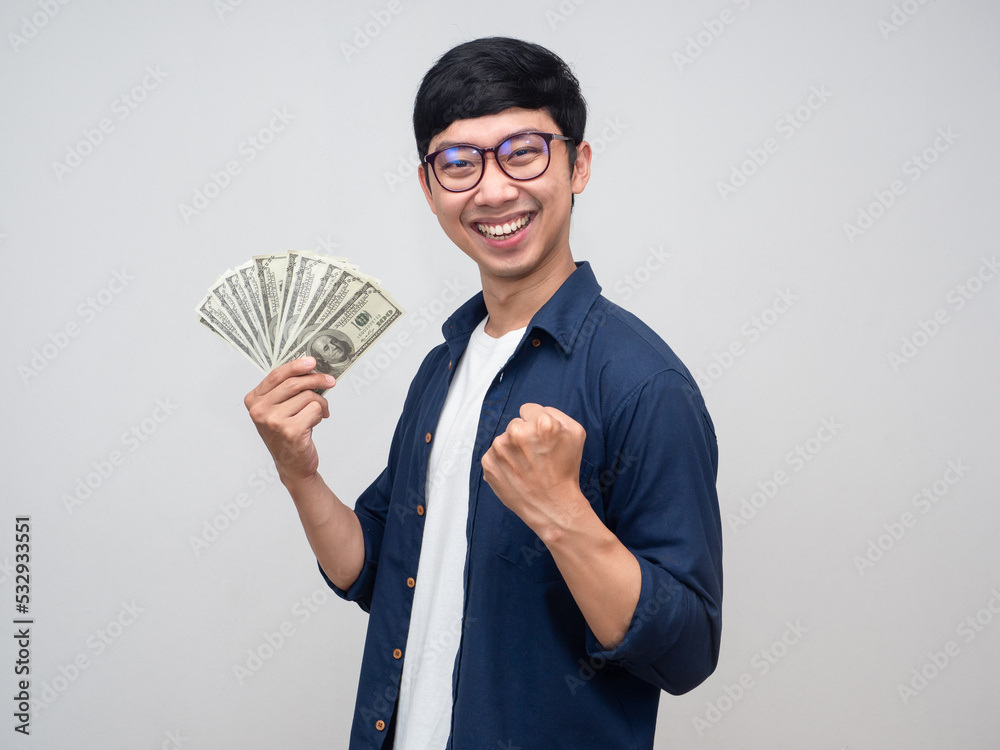 Positive asian man glasses show fist up about earn money success working Positive asian man glasses show fist up about earn money success working