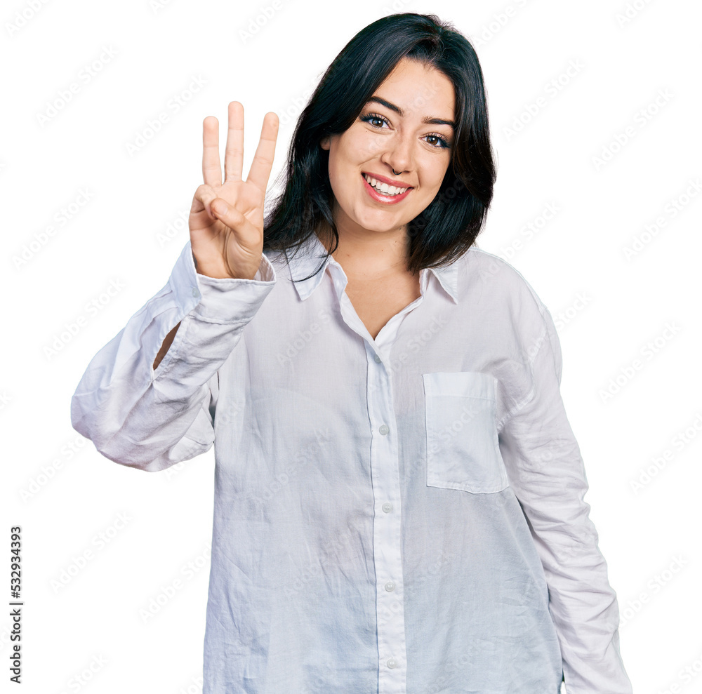 Beautiful hispanic woman wearing casual white shirt showing and pointing up with fingers number three while smiling confident and happy. Beautiful hispanic woman wearing casual white shirt showing and pointing up with fingers number three while smiling confident and happy.