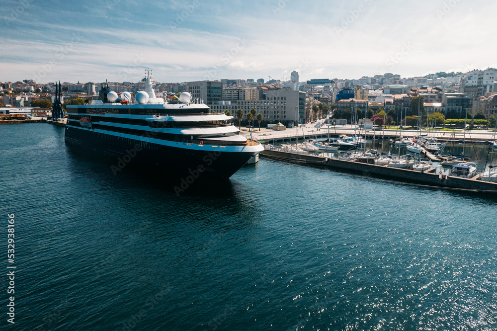Aerial drone view of cruise ship, marina and view of centre of Vigo, Galicia, Spain