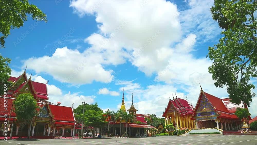 Buddhist temple with two gold pagoda and gray cloud moving time lapse Buddhist temple with two gold pagoda and gray cloud moving time lapse
