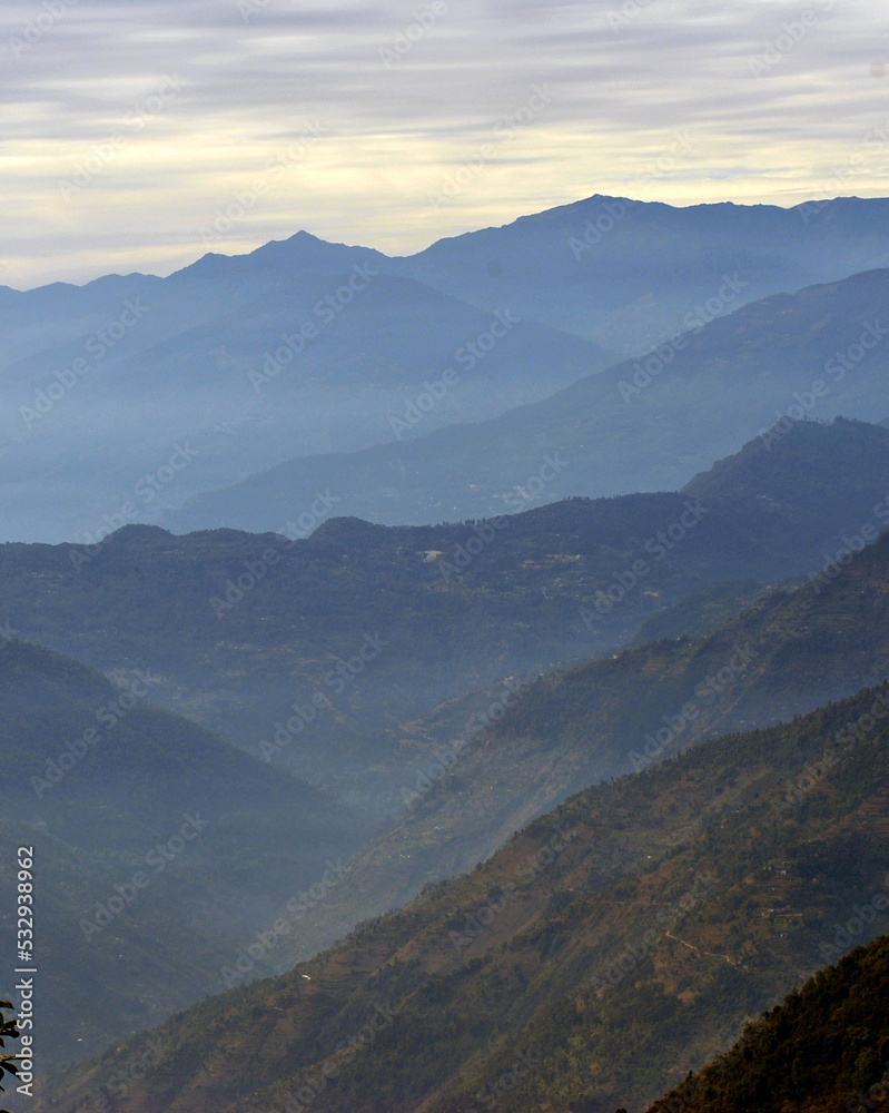 A fascinating view of horizons after horizons layers looks mesmerizing as seen from Temi Tea Estate near Damthang in South Sikkim.