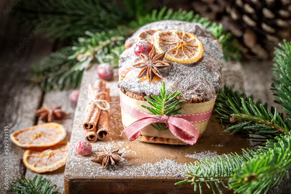 Orange gingerbread cake for Christmas on wooden tray