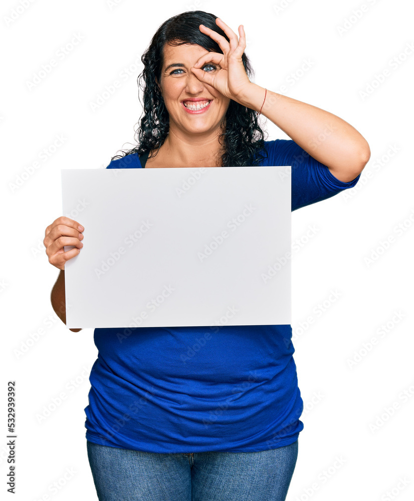 Plus size brunette woman holding blank empty banner with open hand doing stop sign with serious and confident expression, defense gesture Plus size brunette woman holding blank empty banner with open hand doing stop sign with serious and confident expression, defense gesture