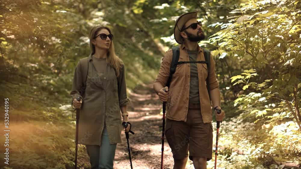 Tourist Hiker Activity In Forest With Walking Stick. Adventure Hiking Waling Stick Nordic Walk. Hiking Hiker On Mountain Forest. Nordic Hiking In Wood. Trekker Summer Forest Workout Trekking In Jungle Tourist Hiker Activity In Forest With Walking Stick. Adventure Hiking Waling Stick Nordic Walk. Hiking Hiker On Mountain Forest. Nordic Hiking In Wood. Trekker Summer Forest Workout Trekking In Jungle