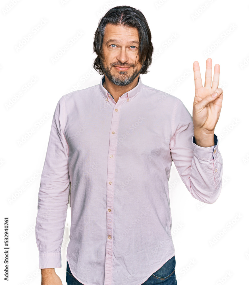 Middle age handsome man wearing business shirt showing and pointing up with fingers number three while smiling confident and happy. Middle age handsome man wearing business shirt showing and pointing up with fingers number three while smiling confident and happy.