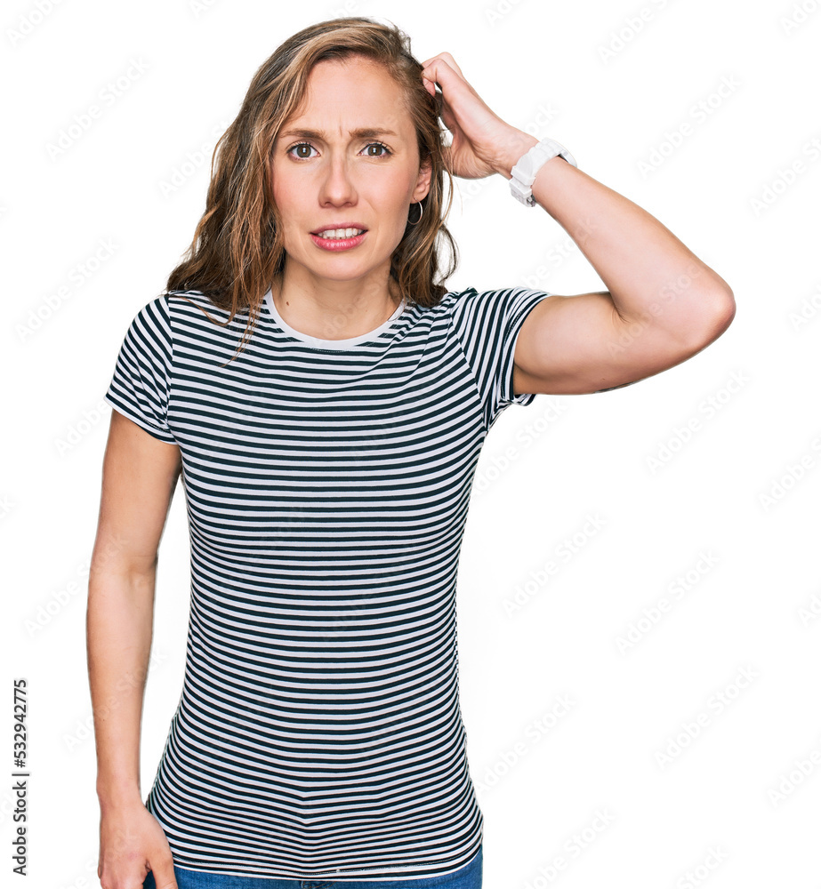 Young blonde woman wearing casual clothes confuse and wonder about question. uncertain with doubt, thinking with hand on head. pensive concept. Young blonde woman wearing casual clothes confuse and wonder about question. uncertain with doubt, thinking with hand on head. pensive concept.