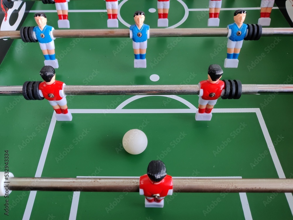 Arcade table soccer with tools for playing for office and home games. Arcade table soccer with tools for playing for office and home games.