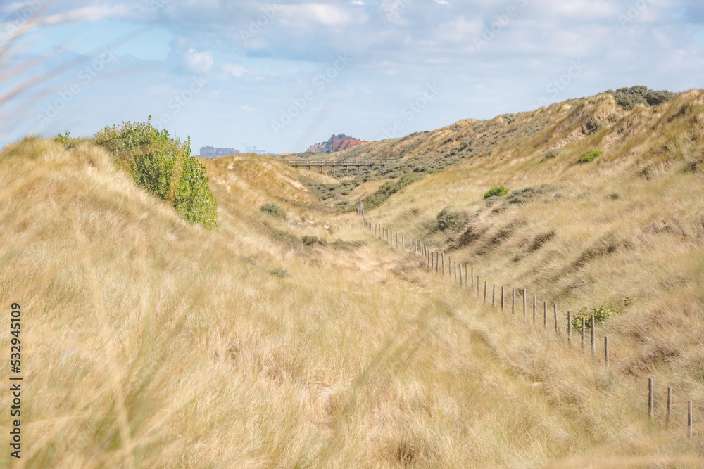 landscape dunes with sky and clouds and beach landscape dunes with sky and clouds and beach