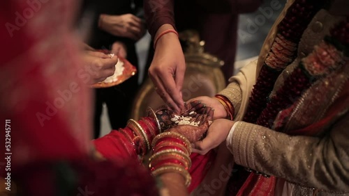 A shot of rituals being performed at an Indian Wedding in India