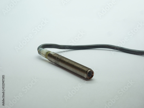 threaded  inductive proximity sensor with cable used in industrial automation photo
