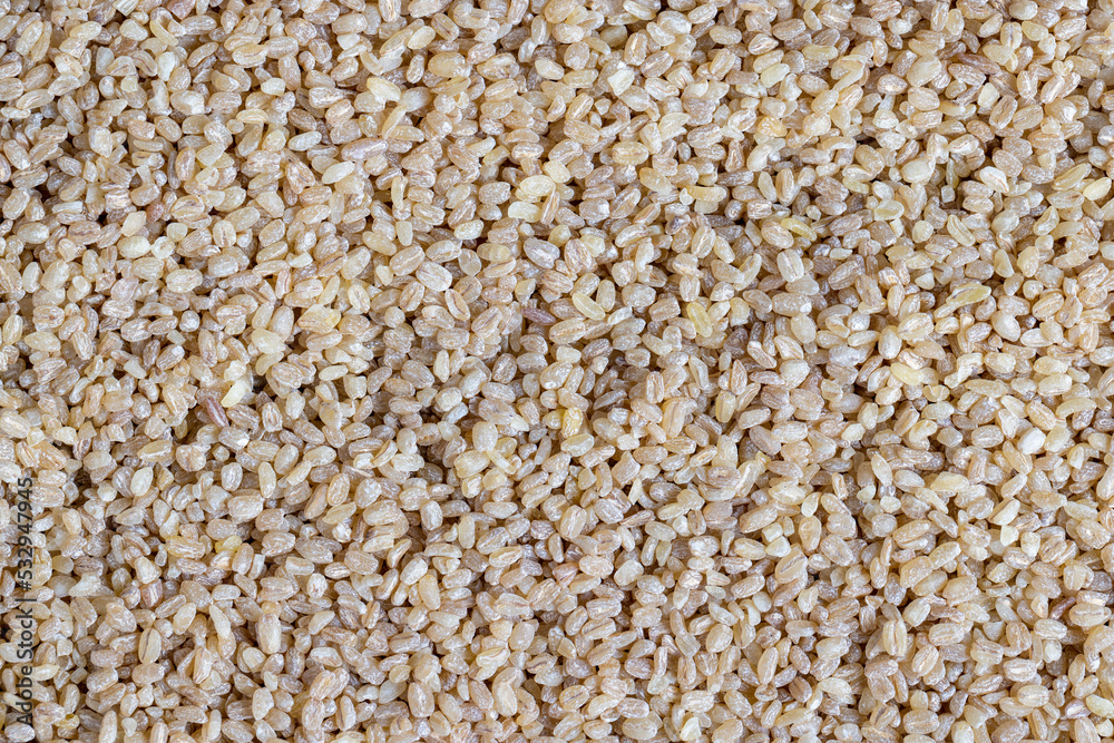 Fresh uncooked bulgur porridge on the table Fresh uncooked bulgur porridge on the table
