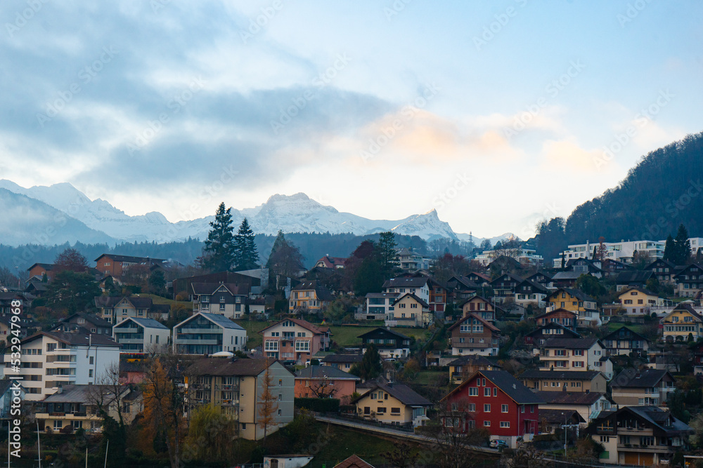 Nice scape of Thun city and Mt.Niesen from Spiez Castle and Tower on the hills near Lake Thun during autumn , winter morning  : Spiez , Switzerland : December 4 , 2019