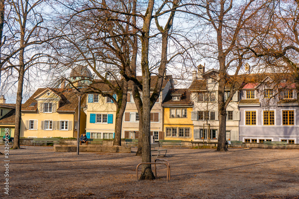 Naklejka premium Lindenhof hills , garden and observation desk in old town of Zurich during autumn , winter sunny day : Zurich , Switzerland : December 6 , 2019